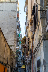 A Narrow Alley with Apartments and Balconies in Naples Italy