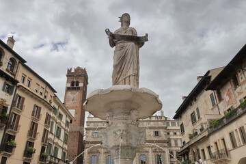 Sculpture and fountain in Erbe square, historic square of Verona, Veneto, Italy
