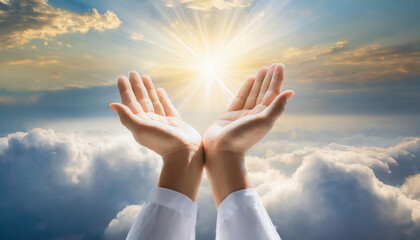praying human hands towards  divine light and the clouds in the sky - obrazy, fototapety, plakaty