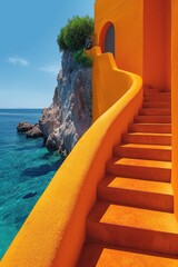 A staircase leading up to a building with a view of the ocean. The building is orange and the steps are also orange