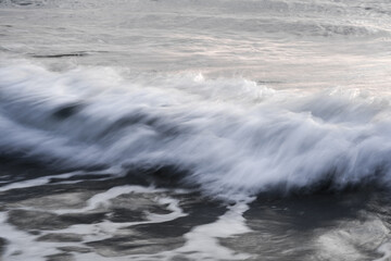 Slow shutter effect of waves at the beach