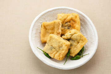 Tahu Petis, fried tofu filled with black shrimp paste. Indonesian food
