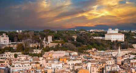 Fototapeta na wymiar Rome's skyline glows at sunrise or sunset, with cream buildings and a key landmark. A green park in the foreground under a vivid blue and orange sky showcases the city's mix of nature and history.