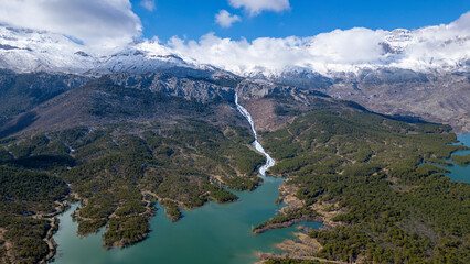 Aerial texture of irrigation dam, forests, trees, ecosystem, mountains and ecological mystical landscape - 774513286