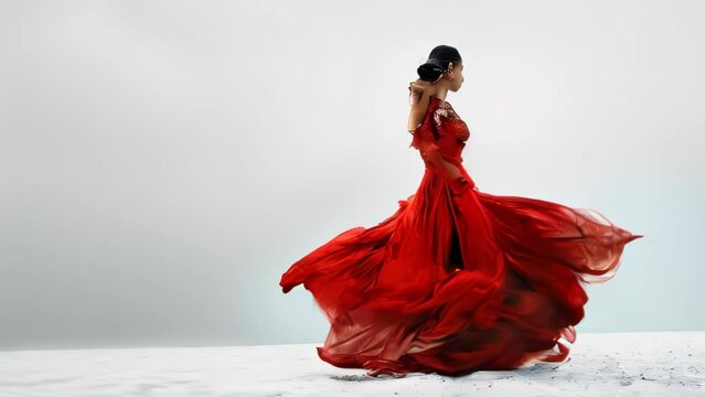 A passionate flamenco dancer wearing a fiery red dress performs a dynamic dance that blazes like flames. Her intense movements and expressions convey the soul she pours into dancing to the music. 