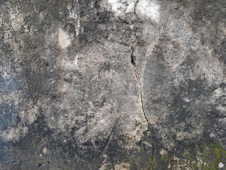 Old vintage crack wall texture background. Crack in concrete wall	
