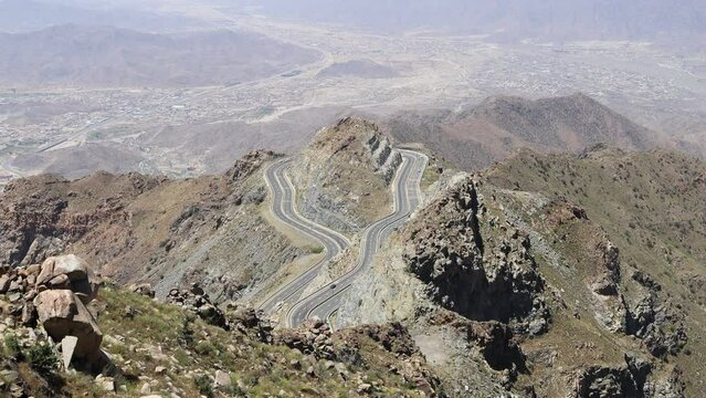 Al Taif , Saudi Aarabia Al Hada Mountain in Taif City, Saudi Arabia with Beautiful View of Mountains and Al Hada road inbetween the mountains. (aerial photography)