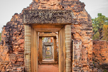 Naklejka premium Close up to the ruin ancient brick gate of Pre Rup temple in Siem Reap, Cambodia