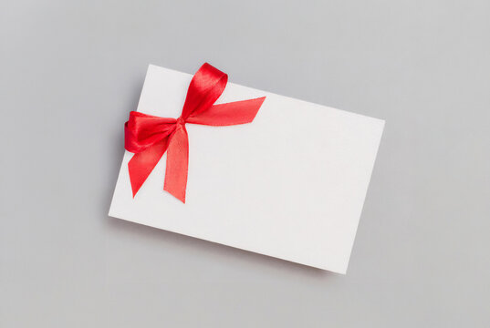 Blank gift tag and card adorned with ribbon for any occasion