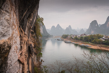View of the Li River with azure water among scenic karst mountains at Yangshuo