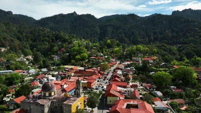 Aerial view backwards over the Mineral del Chico town, in sunny Hidalgo, Mexico