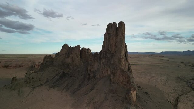Aerial zooming in on Church Rock in Monument Valley Arizona