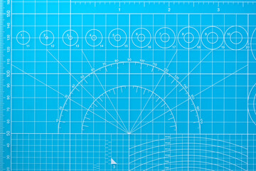 blue cutting mat board background with line and scale measure guide pattern for object art design, tool equipment of diy craft work