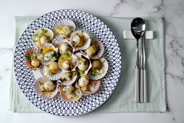 grilled scallops with cheese on them