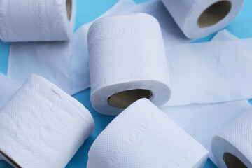 Toilet paper on blue background.