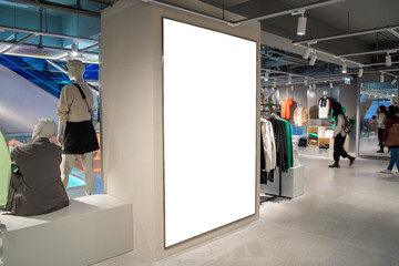 Fototapeta premium Mockup Blank LED billboard or lightbox at front showroom of clothes store