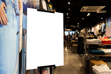 Mockup blank banner with Stack of beautiful t-shirts in clothes store