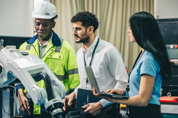 Robotic engineer and team oversee software, machine tool performance, enhance program for efficiency