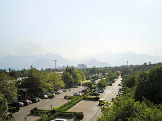 City  parking lot on the boom of the big mountains in Antalya in Turkey