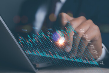 Businessman using laptop trading forex stock market. Business financial data.