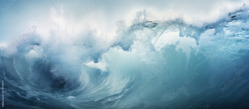 Poster a massive wave in the ocean is forcefully breaking and creating a dramatic splash with white foam