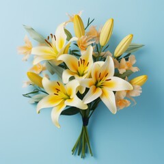 Fototapeta na wymiar Bouquet of yellow lilies on light blue background.