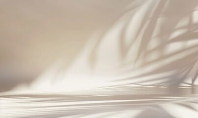 Obraz premium Blurred shadow cast by palm leaves on a light cream wall provides a minimalist yet captivating backdrop, ideal for product presentations during the summer and spring. Made with generative AI technolog