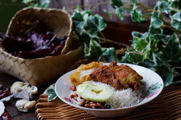 Nasi lemak, a Malay style complete meal of fragrant rice cooked in coconut milk