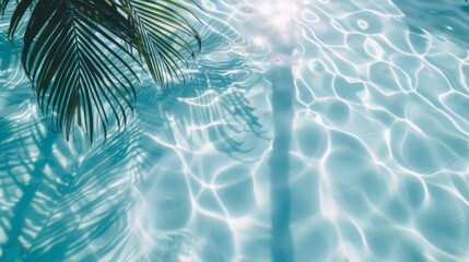 Summer day at a tranquil pool, capturing the ripple of clear turquoise water with soft shadows of...