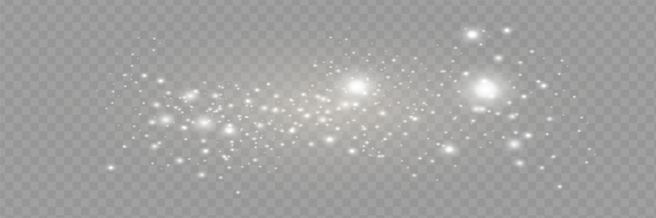 The dust sparks and golden stars shine with special light. Vector sparkles on a transparent background. Christmas light effect. Sparkling magical dust particles.