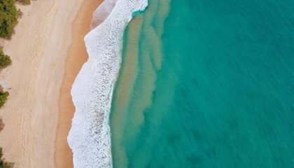 Fototapeta na wymiar Turquoise water with wave with sand beach background aerial top view in sunset. Concept summer