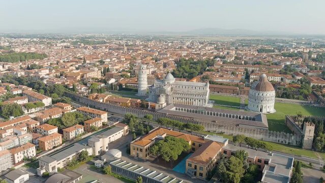 Pisa, Italy. The famous Leaning Tower and Pisa Cathedral in Piazza dei Miracoli. Summer. Evening hours, Aerial View, Point of interest