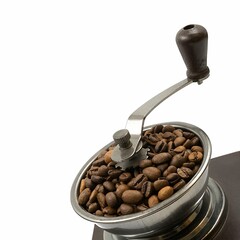 Old coffee grinder with coffee beans on white background