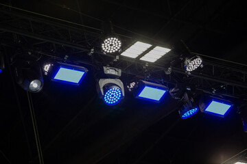 Ceiling lamps, spotlights provide light.