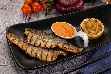 Grilled seabass fillet with lemon