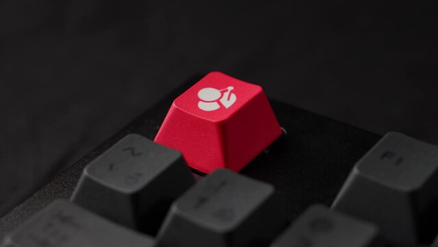 Red key on a mechanical keyboard, used for special functions