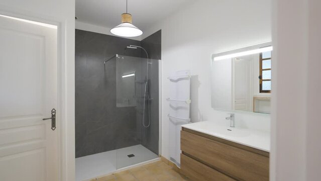 Modern bathroom with shower and vanity