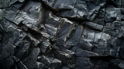 Foto op Plexiglas Dark grey stone texture background. Natural pattern of black rock surface,pile of charcoal isolated on black background. top view,black crumpled paper background texture © sami
