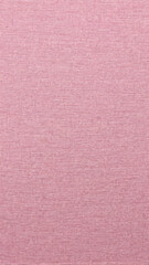 Fototapeta premium Vertical textured abstract background with pale pink color fabric