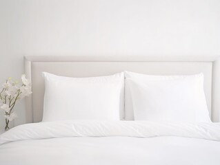 Fototapeta na wymiar a bed with white sheets and pillows