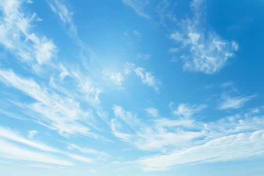 Blue sky with clouds background.
