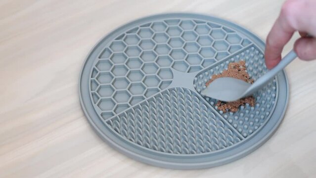 textured silicone dog feeding bowl. Lick mat for long feeding of pets