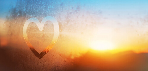 love, kindness and care, heart drawn on the window glass, banner background with copyspace - obrazy, fototapety, plakaty