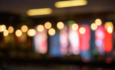 Abstract blurred image of cafe or restaurant with bokeh lights background at night. - 774668050