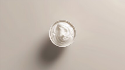 Luxury cosmetic cream jar top view on a neutral background. Skin care product container. Elegant simplicity in product photography. AI