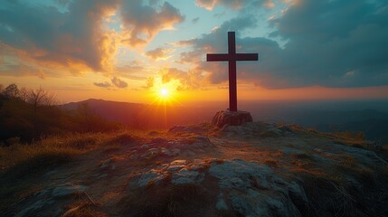   A hilltop cross against a sunset backdrop, with clouds scattering above - obrazy, fototapety, plakaty