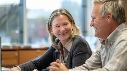 Smiling business executives in a meeting