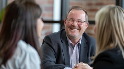 Smiling business executives in a meeting