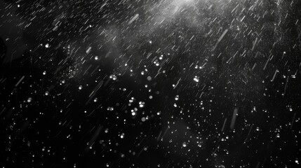 Rain on a black background. Raindrops falling against a backdrop of darkness, creating a serene ambiance. - obrazy, fototapety, plakaty