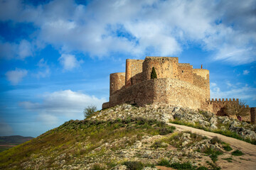 Fototapeta na wymiar View of the medieval castle of Consuegra, Toledo, Castilla la Macha, Spain, on top of a hill